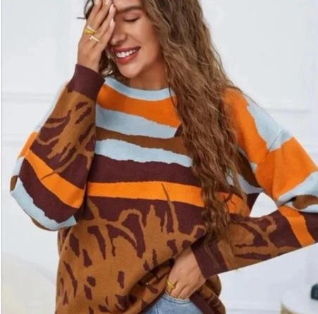 Solid color wool sweater with low shoulders