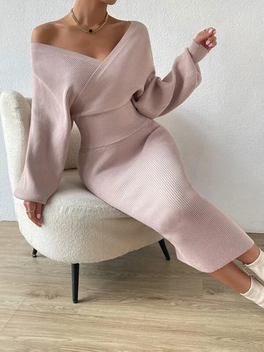 Knitted skirt with wool sweater, overlapping neck and batwing sleeves